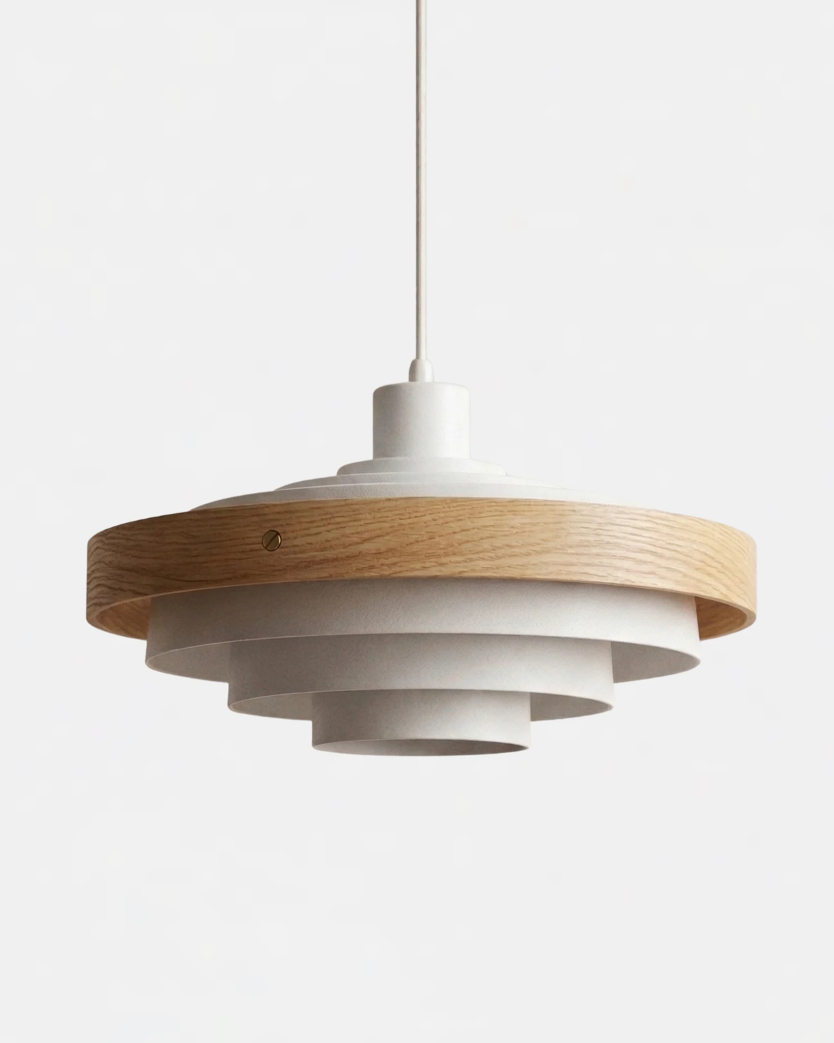 Wood pendant light STECCA No.01 in matte white with light walnut ring, tiered metal shade, unlit