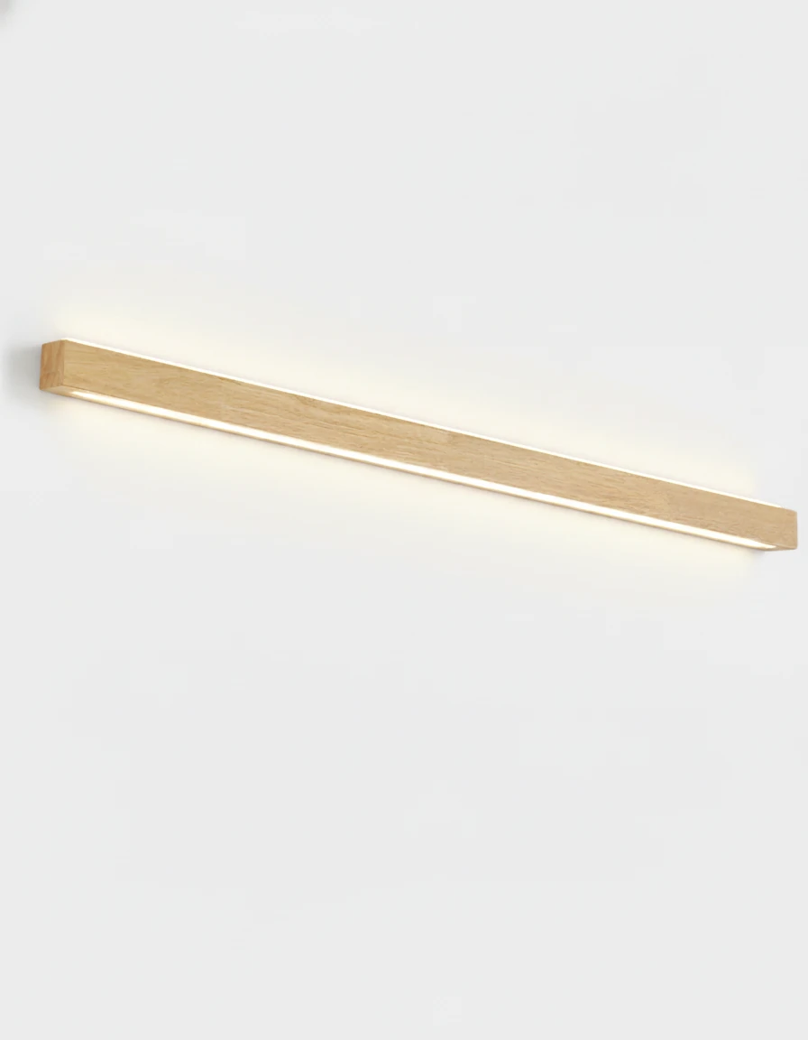 Wood wall sconce PIANO No.01, 120 cm light walnut bar glowing upward and downward, switched on